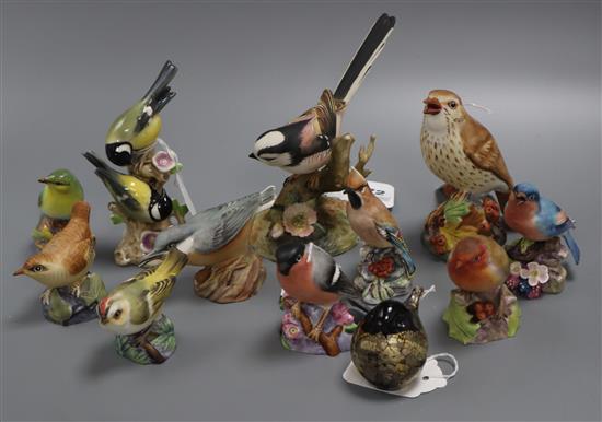 A Goebel model, Great Titmouse and ten Royal Worcester models of birds,